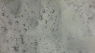 Banyo köpüğü. Dönen ve kıvrımlı banyo köpüğü. Sağlık ve kaplıca konsepti.