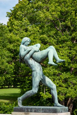 Oslo, Norway - July 12, 2023: Sculpture in Frogner Park, sculpture created by Gustav Vigeland. Public park in capital city of Norway. clipart