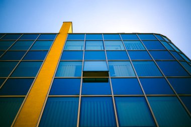 Modern Geometric Facade with Glass and Metal Louvers clipart