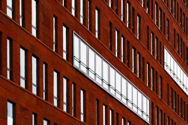 Brick Facade Office Building with Symmetrical Windows and Modern Architectural Features clipart