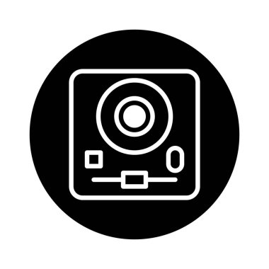 Siyah dairesel arkaplan üzerine beyaz olarak çizilmiş bir kameranın basit bir vektör çizimi. Logolar, simgeler ya da modern teknoloji gerektiren her tasarım için mükemmel..
