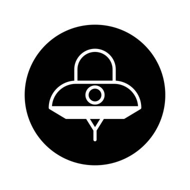 Tanımlanamayan uçan bir cismin minimalist silueti, siyah dairesel bir arkaplan üzerine kurulmuş, bir gizem ve entrika hissi uyandırıyor..