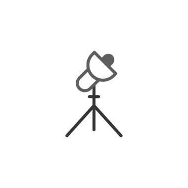 Bir tripodun üzerindeki stüdyo spot ışıklarının minimum grafik tasviri, modern tasarım duygusunu çağrıştırıyor ve temel fotoğraf veya video araçlarına odaklanıyor. Resim temsil etmek için uygundur