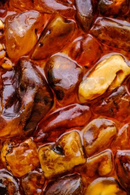 Kehribar taşının soyut dokusu ve arkaplanı