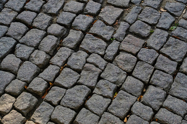 Old stone paving stones, road surface