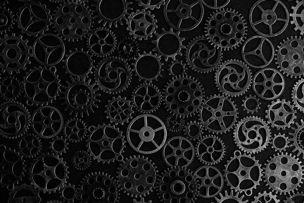 Black and white background with metal gears