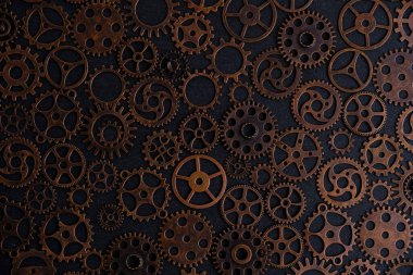 Metalli arka plan, çeşitli bakır dişliler.