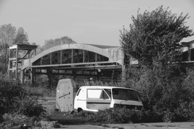 Old disassembled car background arch hangar abandoned airfields
