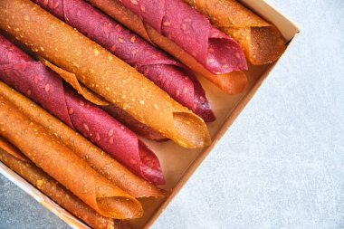 Fruit and berry pastille, dessert with nuts and seeds in a box