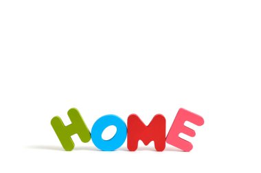 Word house laid out multicolored letters white background