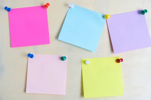 Colorful stickers for written notes are fixed plywood board