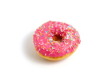 Donut with pink icing and multicolored sugar sprinkles.On white background