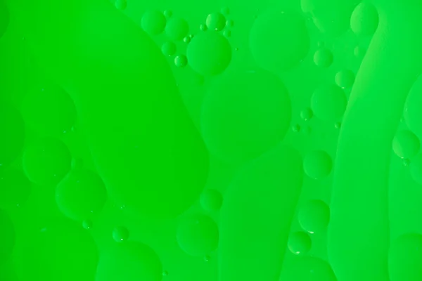 Abstracte Achtergrond Met Groene Oliekringen Verloop — Stockfoto