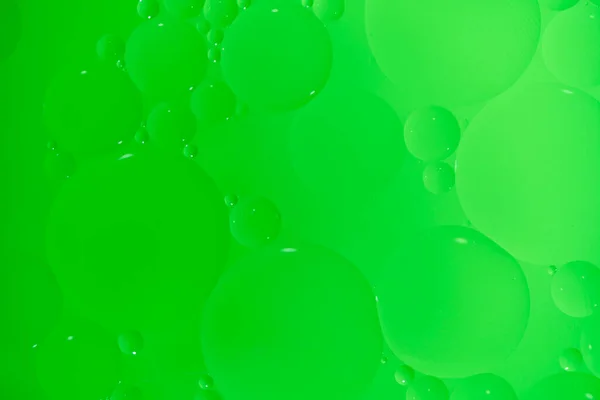 Абстрактный Фон Зелеными Нефтяными Кругами Градиентом — стоковое фото