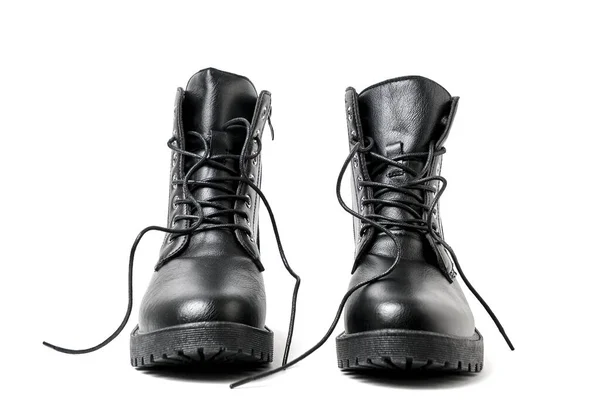 鞋带白色底的黑色皮靴 — 图库照片