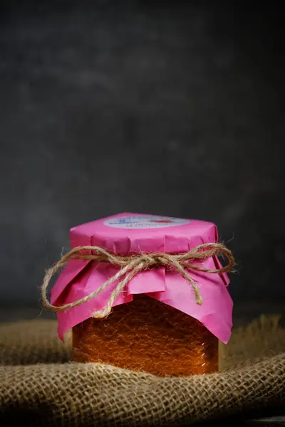 Glass Jar Strawberry Honey Stands Burlap Dark Background — Stock Photo, Image
