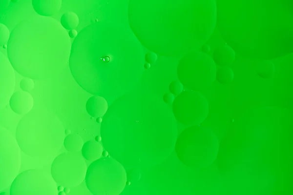Abstrakter Hintergrund Mit Grünen Ölkreisen Und Farbverlauf — Stockfoto