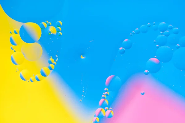 Φωτεινό Αφηρημένο Πολύχρωμο Φόντο Κύκλους Λαδιού Μπλε Κίτρινο Και Ροζ — Φωτογραφία Αρχείου