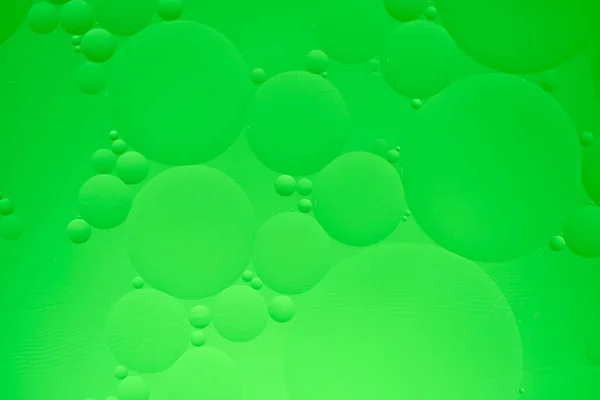 Abstrakt Bakgrund Med Gröna Oljecirklar Och Lutning — Stockfoto