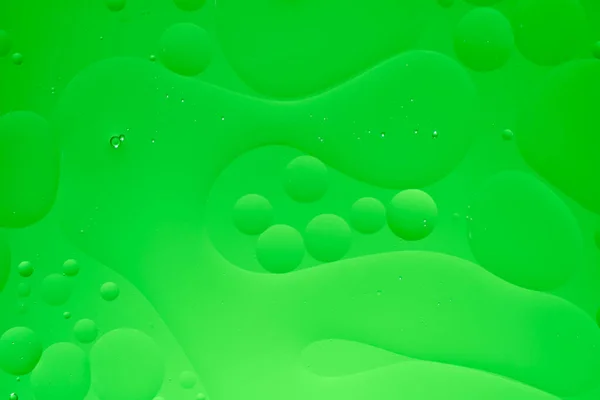 Abstracte Achtergrond Met Groene Oliekringen Verloop — Stockfoto