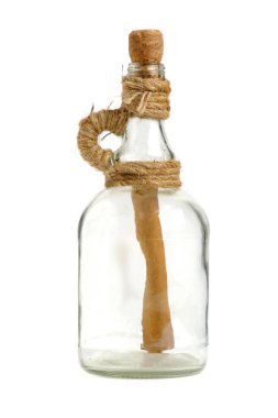 İçinde mühürlü kağıtlar olan eski bir şarap şişesi.