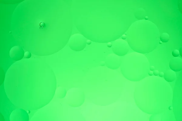 Абстрактный Фон Зелеными Нефтяными Кругами Градиентом — стоковое фото