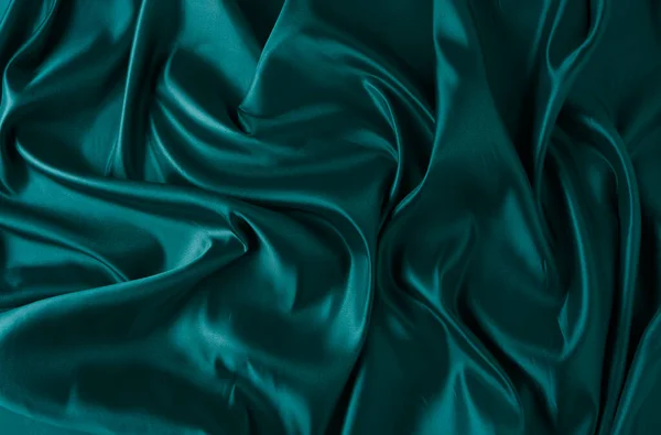 真丝面料 抽象波纹绿色缎子面料背景 — 图库照片