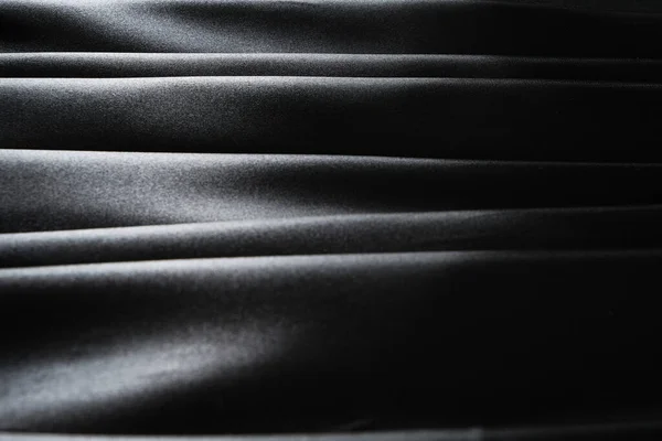 Pek Kumaşın Yatay Çizgileri Saten Kumaşın Siyah Soyut Arkaplanı — Stok fotoğraf