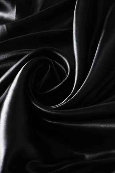 Φόντο Μαύρο Στριμμένο Μεταξωτό Ύφασμα Αφηρημένη Υφή Σατέν Ύφασμα — Φωτογραφία Αρχείου