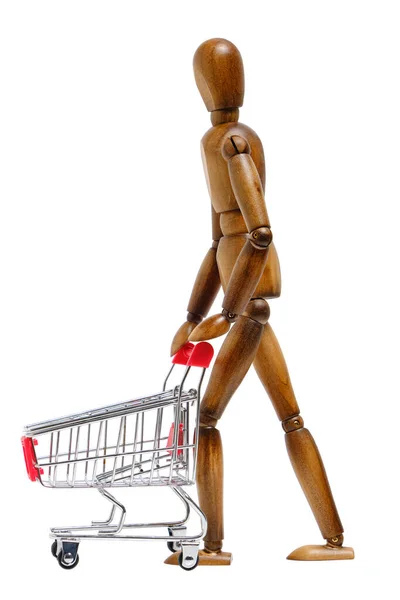 Wooden Brown Mannequin Rolls Shopping Cart Front Him Concept Going — Stock Photo, Image