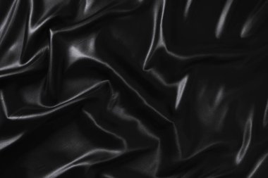 İpek kumaş, soyut dalgalı siyah saten kumaş arkaplan
