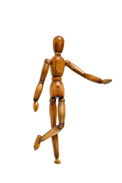 Dřevěné Hnědé Figuríny Stojí Zvednutou Nohou Bílé Izolovat Pozadí — Stock fotografie