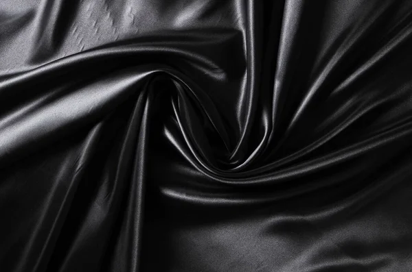 Pozadí Černé Kroucené Hedvábí Tkaniny Abstraktní Textura Saténové Tkaniny — Stock fotografie