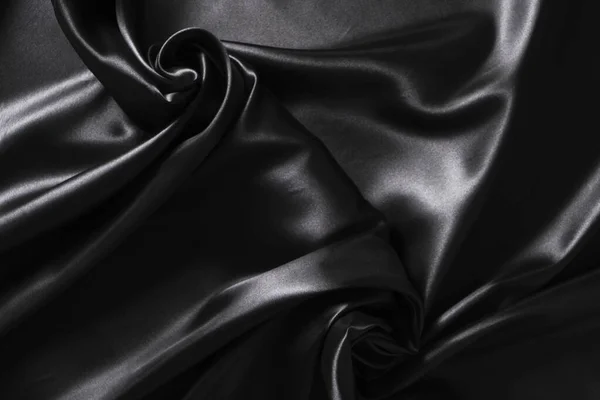 Pozadí Černé Kroucené Hedvábí Tkaniny Abstraktní Textura Saténové Tkaniny — Stock fotografie