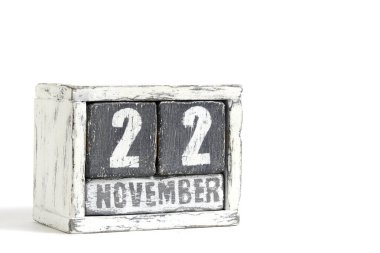 November 22 on wooden calendar, on white background