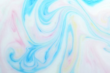 Background with multicolored veins milky white background. Texture of marble