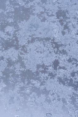 Background, glass is covered with snow and ice