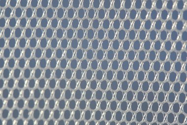 Arkaplan soyut bir makro resim beyaz tüldür.