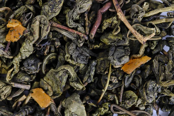 Black and green leaf tea with fruits and berries