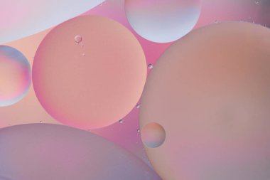 Yağlı daireli su yüzeyli pastel renklerle soyut arkaplan