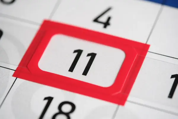 Calendar date. The 11th number the calendar is highlighted in a red frame