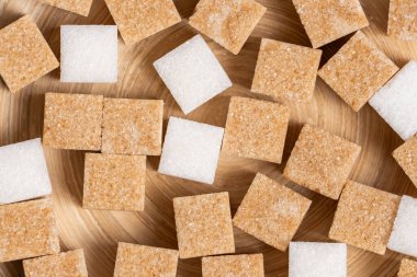 Arka plan, kamış küpleri ve beyaz rafine şeker yakın plan