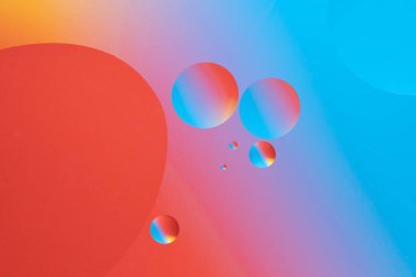 Dinamik kabarcık şekilli renkli soyut bir arkaplan. Kırmızı ve mavi eğim