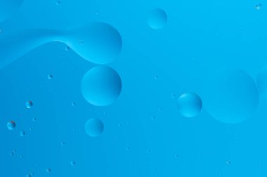 Açık mavi gradyan üzerinde mavi baloncuklu soyut resim