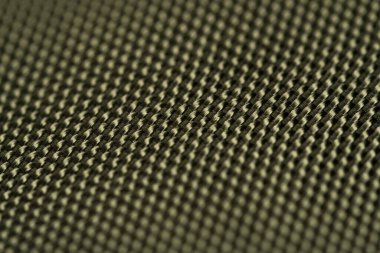 Dokulu karbon fiber arka plan. Makro.