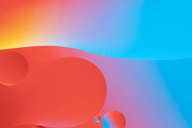 Dinamik kabarcık şekilli renkli soyut bir arkaplan. Kırmızı ve mavi eğim