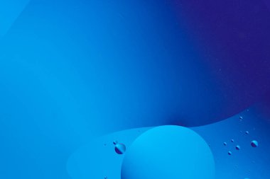 Pürüzsüz çizgiler ve mavi daireler ile soyut eğimli arkaplan