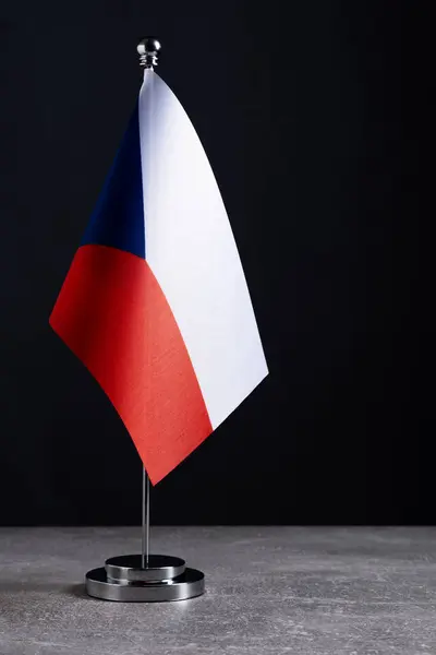 stock image National flag Czech Republic on stand on black background