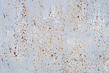Beyaz boyalı paslı metal bir yüzey. Paslı metal dokusu. Tasarım için soyut arkaplan
