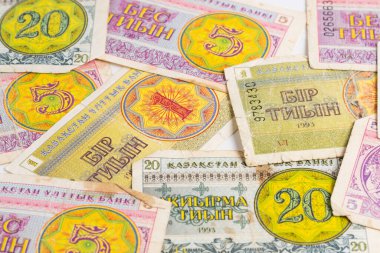 Background from old obsolete Kazakh national currency tiyn